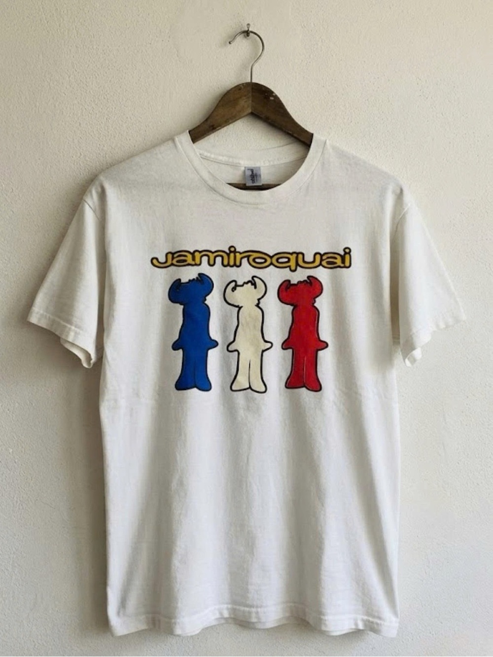 Gildan White Jamiroquai Graphic Tee with Blue, White, Red Figures | Unisex Shirt